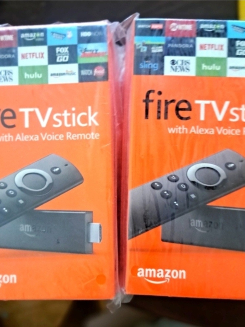 Amazon Fire TV Stick with Alexa Voice Remote — Orange & Black Packaging